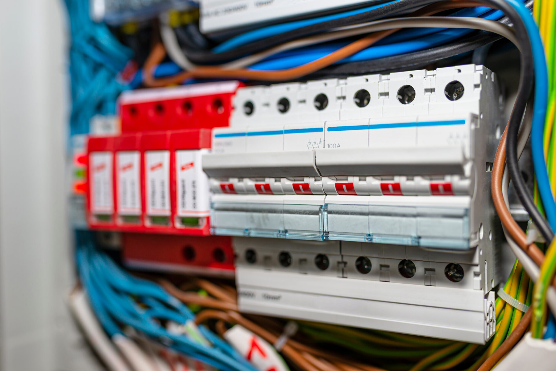 Three-phase fuse in the ON position and surge arrester used to protect the electrical system in the building during electrical discharges, storm protection. Three-phase fuse in the ON position and surge arrester used to protect the electrical system in the building during electrical discharges, storm protection.